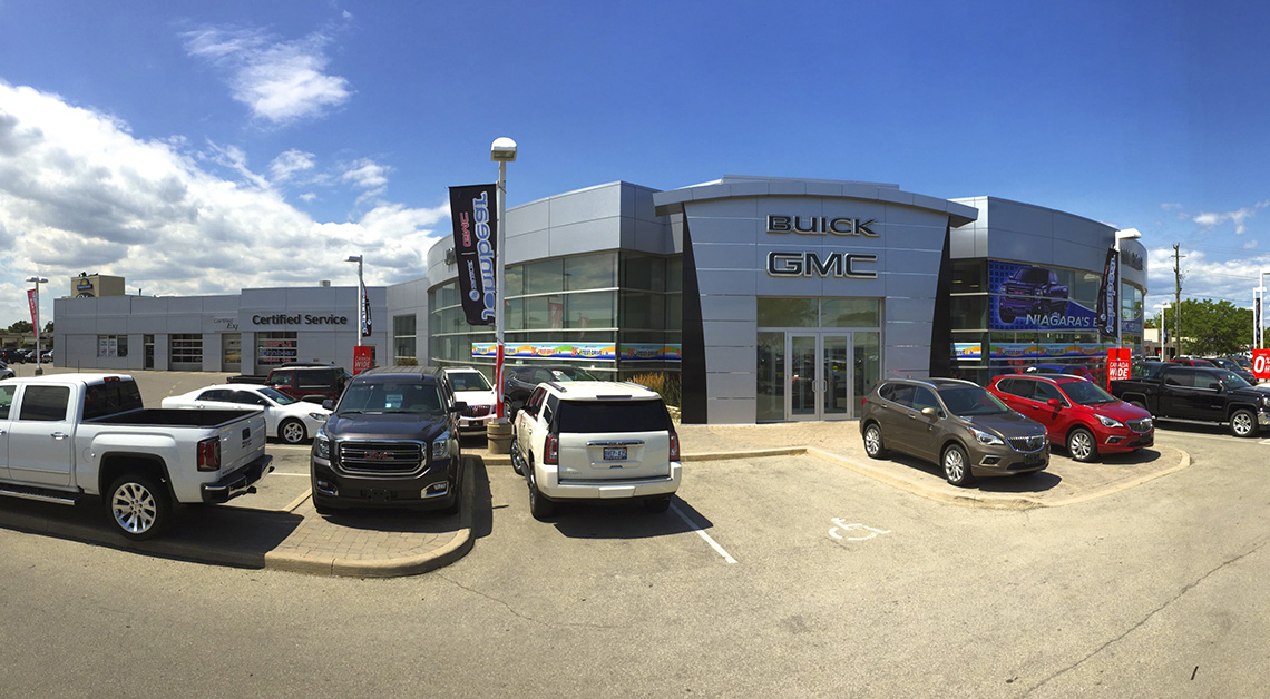 GMC dealership in North America featuring a modern design with exterior cladding made of Aluminum Composite Panels (ACM panels)